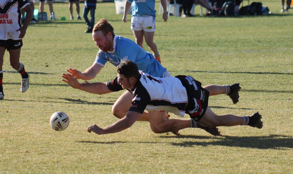 SO CLOSE: Gulgong's Brad James is denied a try in the late stages of Saturday's semi-final. Photo: CONTRIBUTED
