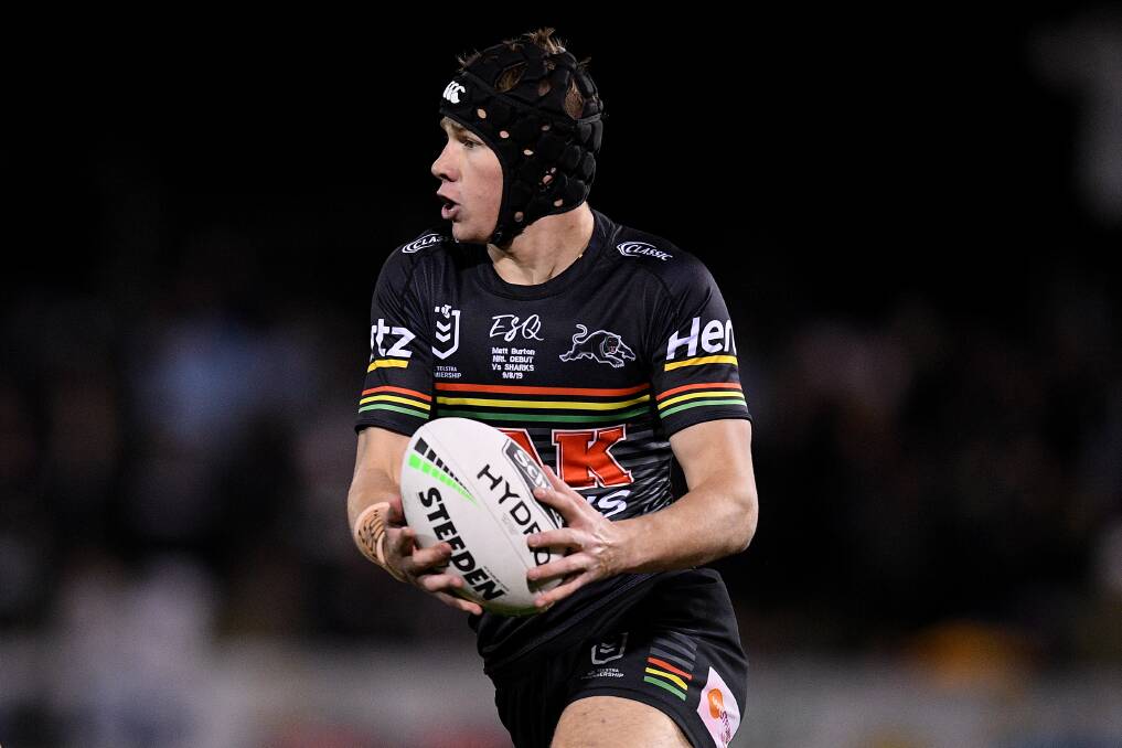 SET IT UP: Dubbo product Matt Burton in action during his NRL debut for the Panthers last week. Photo: AAP