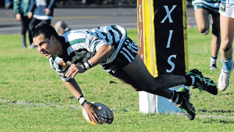Corey Stanley dives over for one of his many tries for Dubbo CYMS. File picture