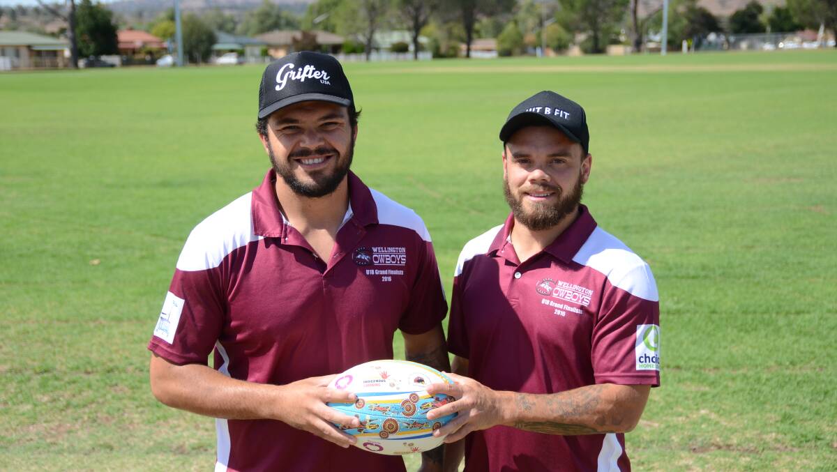 HE'S BACK: Cowboys star signing Justin Toomey-White (left) with captain-coach Aidan Ryan. Photo: ELOUISE HAWKEY