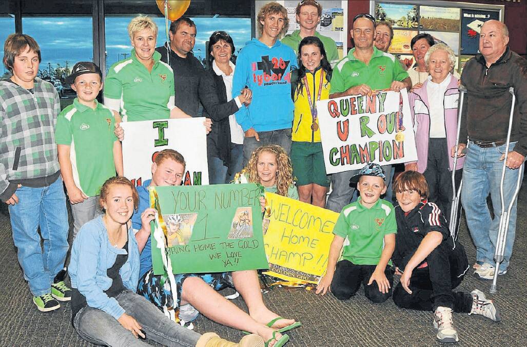 SPECIAL: Megan surrounded by family and friends at Dubbo airport after she returned from India. Photo: FILE
