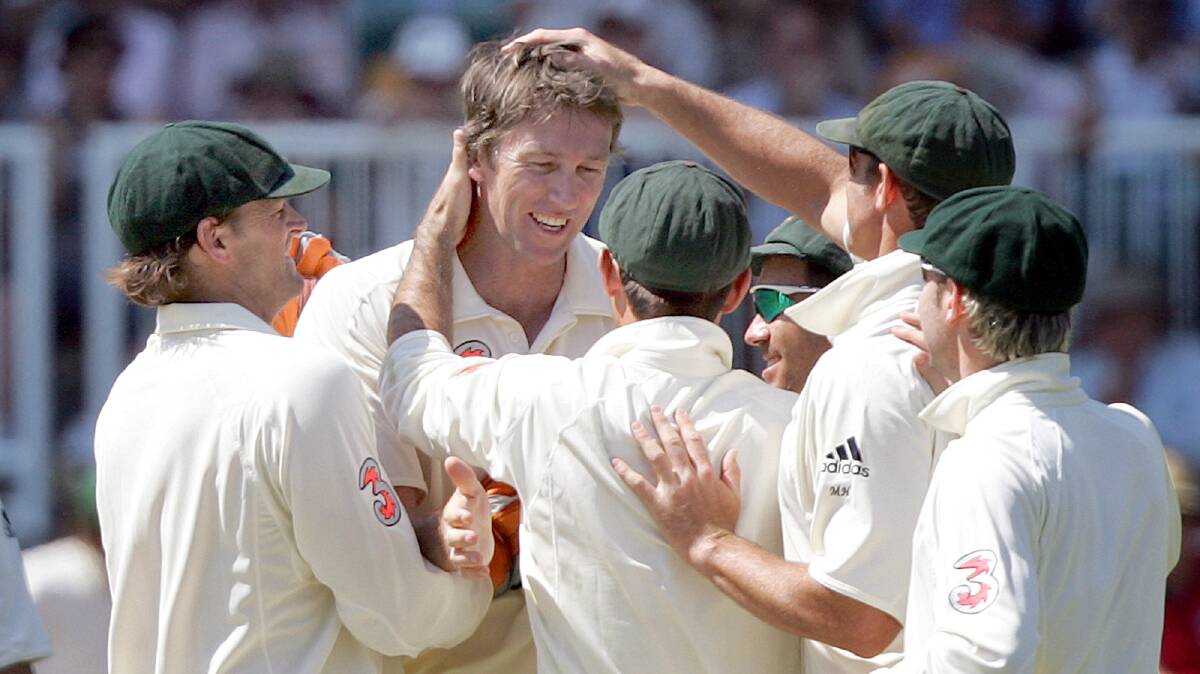 DANGER MAN: Glenn McGrath is mobbed by teammates after one of his many wickets in Ashes Test matches. Photo: RON GRIFFITH/ AP