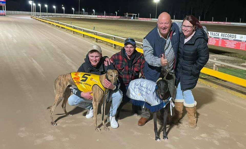 FEATURE FEELING: A delighted Shayne Stiff (back, second from right) and connections of Zipping Aubry with the great Feral Franky on Friday night. Photo: DUBBO GREYHOUNDS FACEBOOK