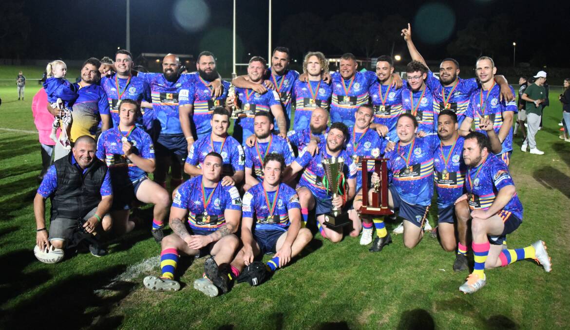 Gerry 'Chicka' Merritt (front left) celebrates with the BRS Merritt Memorial side after winning Saturday's Dubbo Waratahs Rugby League Knockout. Picture by Nick Guthrie