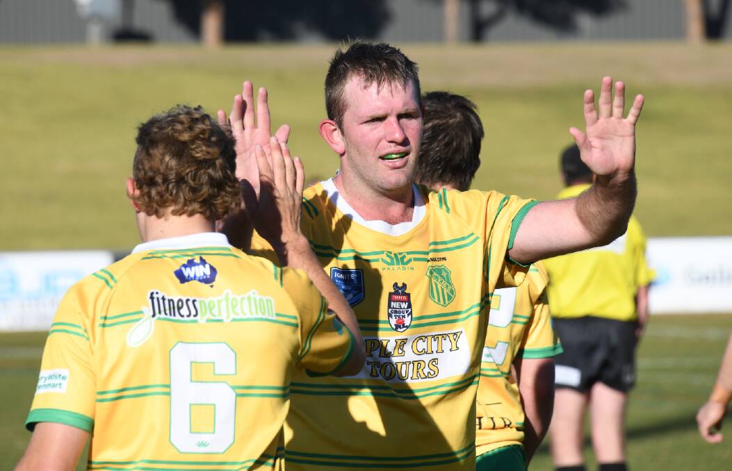 Cam Jones attempts to motivate his teammates during Sunday's heavy loss to Dubbo CYMS. Picture by Amy McIntyre