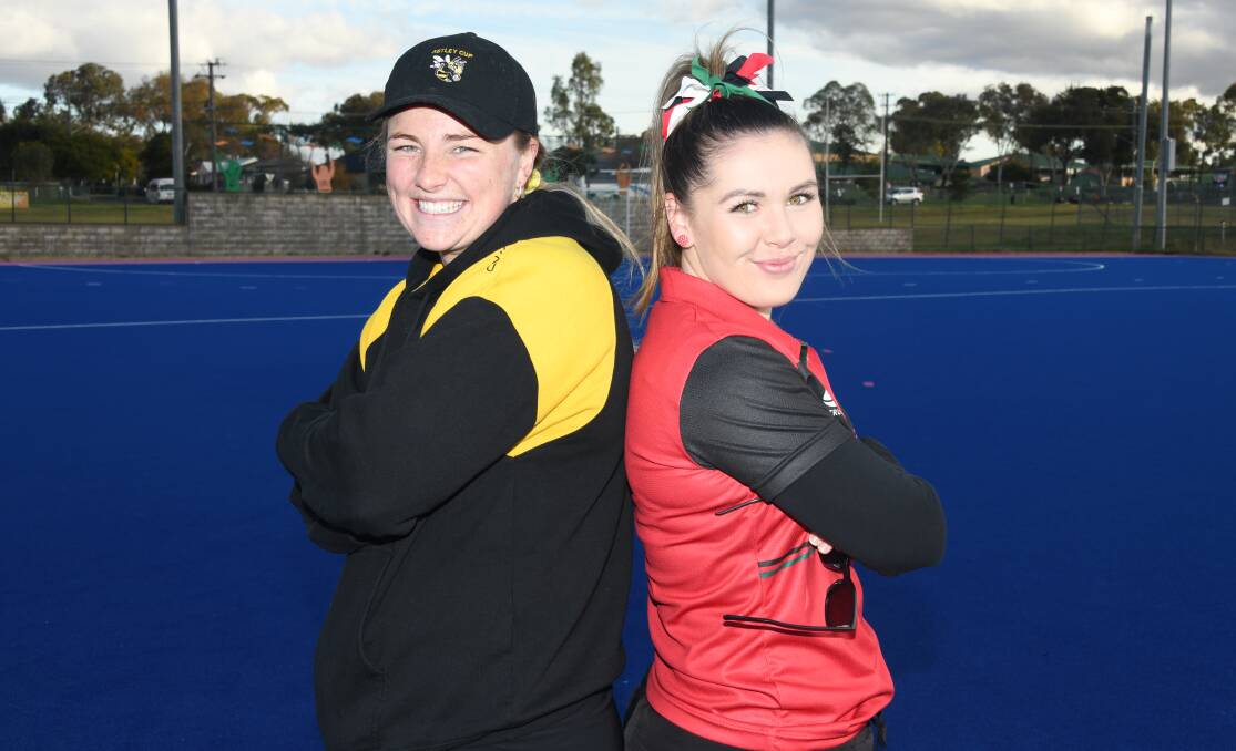 Chloe Barrett (left) and Emma Corcoran were former NSW hockey teammates and now they're teachers competing against each other in the Astley Cup. Picture: Amy McIntyre