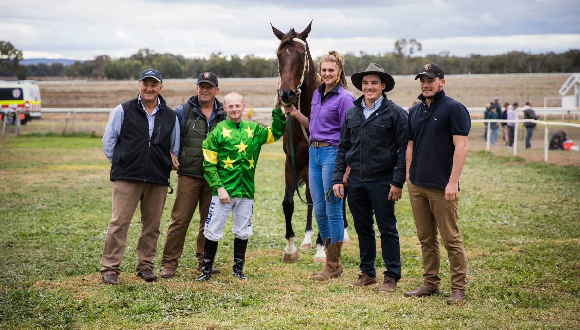 SUCCESS: Brett Thompson and Billy Cray (second and third from left) with More Than Art and connections after winning the Gulgong Cup on Sunday. Photo: SIMONE KURTZ