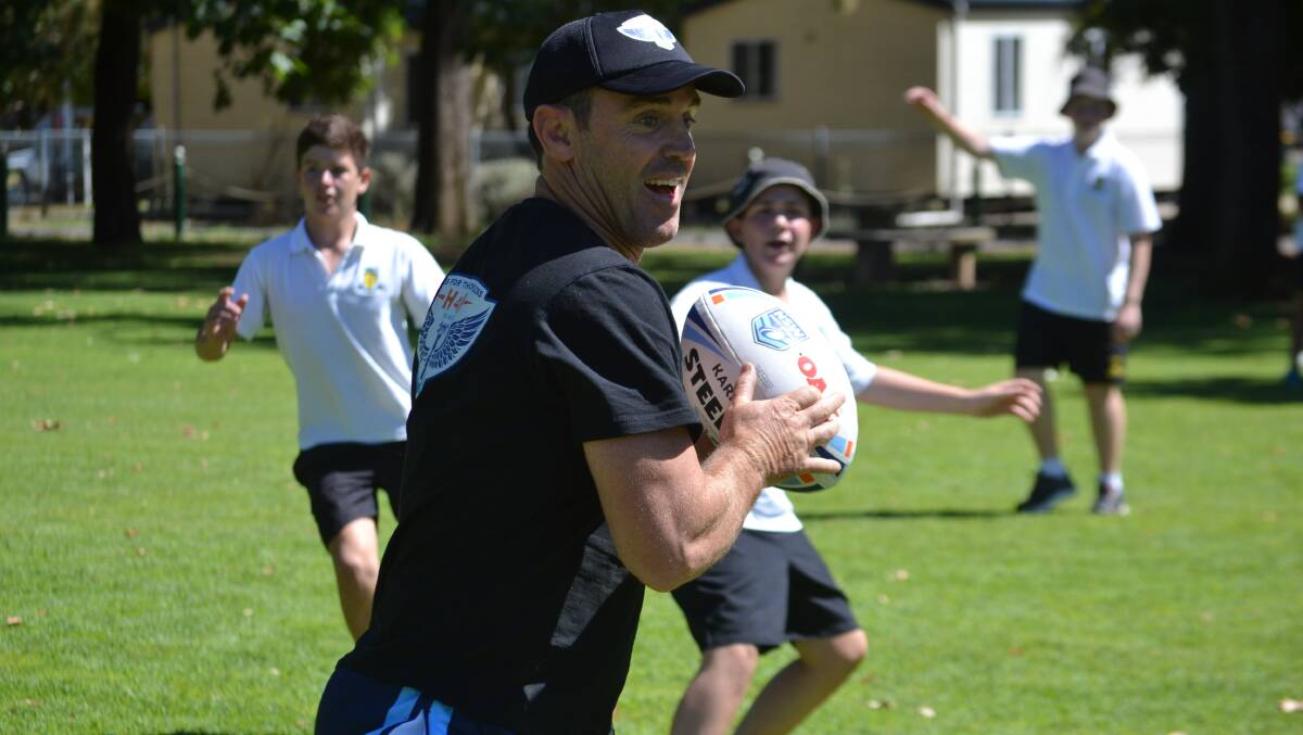 HELPING OUT: Brad Fittler, pictured during a previous visit to the western area, is heading to state's far west this week.
