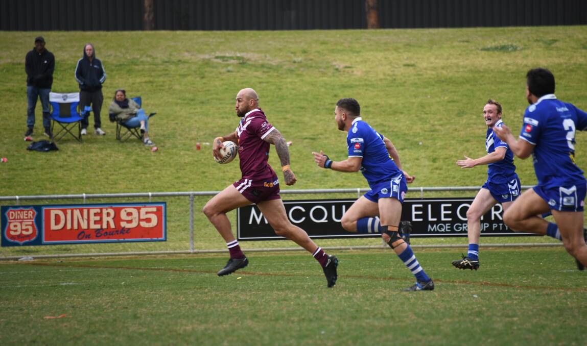 A runaway try for Blake Ferguson put the Cowboys in front during the second half on Sunday. Picture by Amy McIntyre