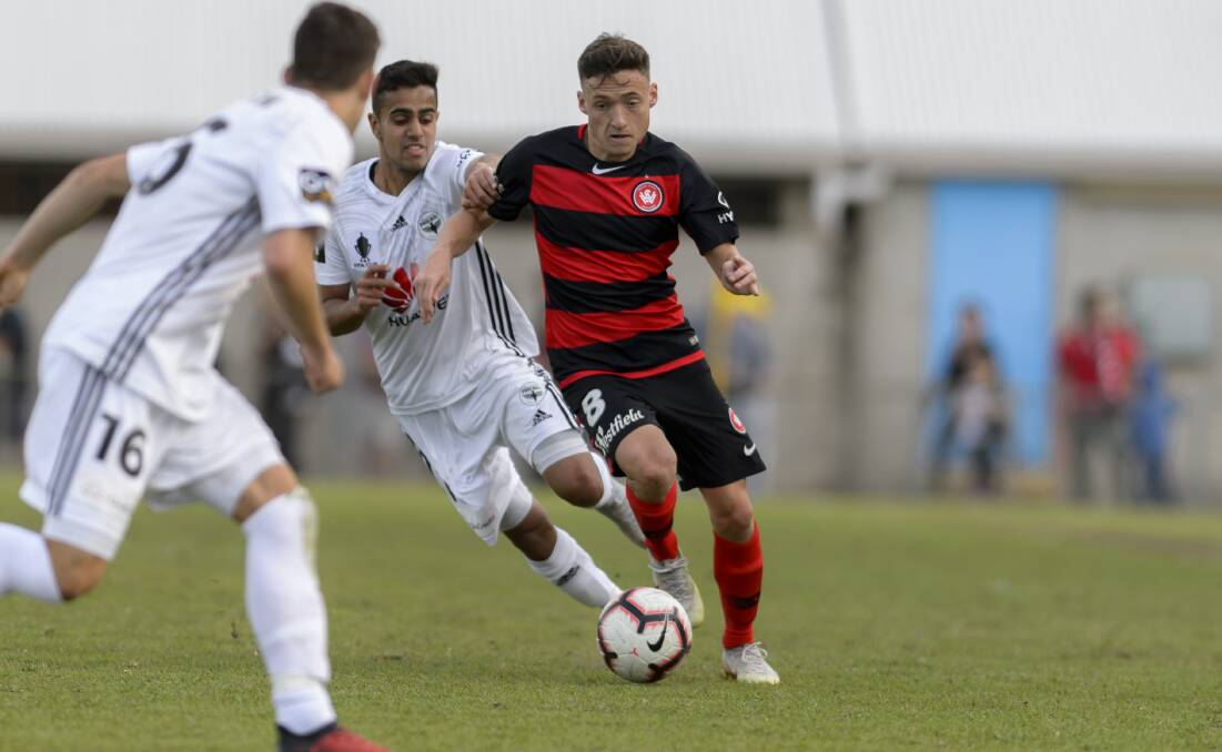 MOVING FORWARD: Jordan O'Doherty, pictured in action against the Wellington Phoenix, is excited for his Western Sydney Wanderers to take the A-League to regional areas. Photo: CONTRIBUTED