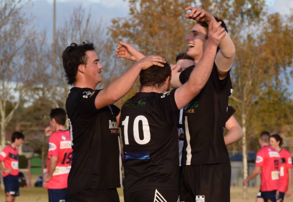 ON THE UP: Newtown players had plenty of reason to celebrate on the weekend. Photo: KARCHERMOORE KAPTURES