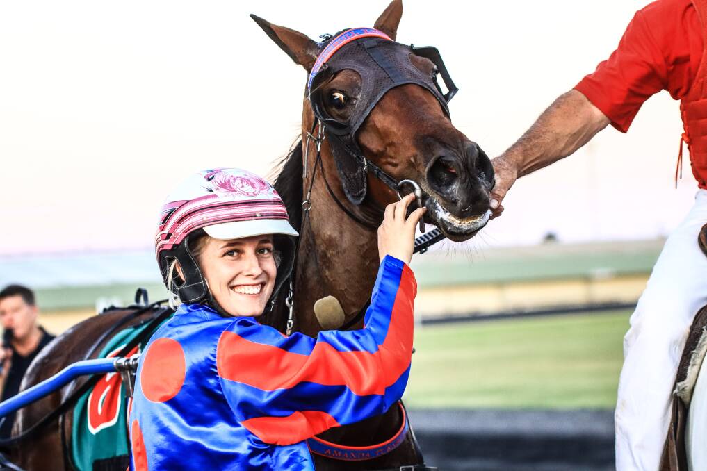 BACK AGAIN: Isobel Ross and Gotta Party Doll after winning last year's Red Ochre feature final. Picture: Coffee Photography