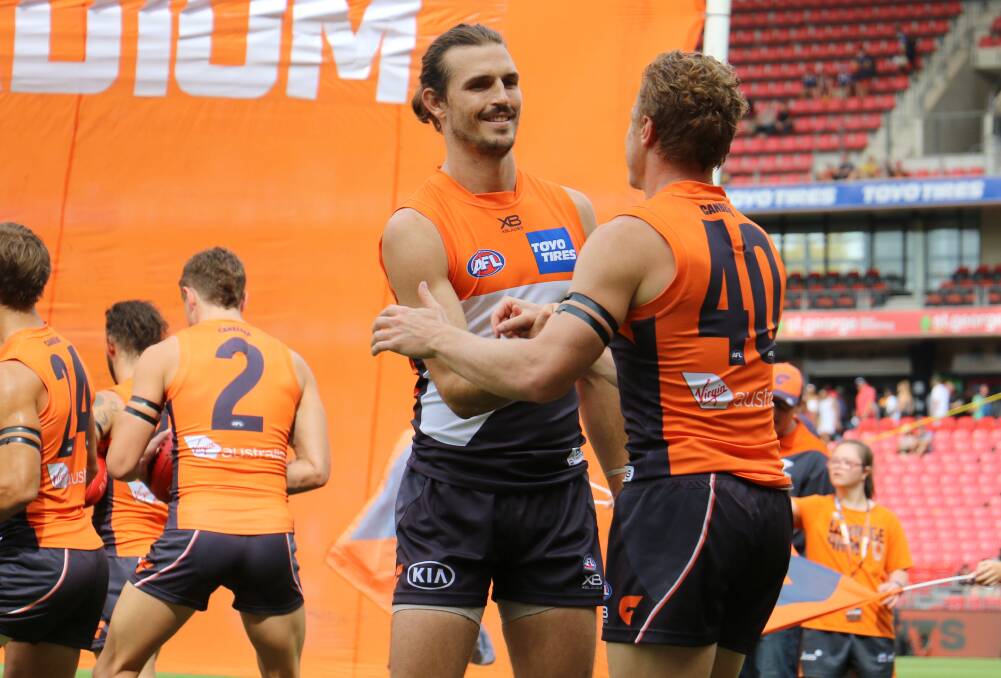 ON THE WAY: GWS Giants star Phil Davis will help juniors in Dubbo on Friday. Photo: GWS GIANTS