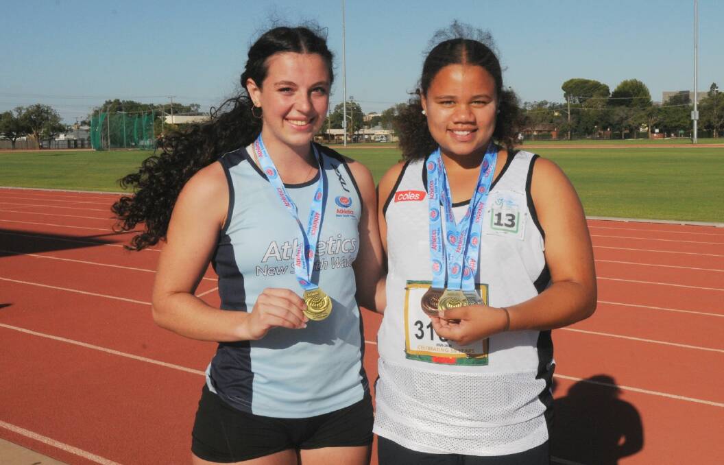 GOLDEN GIRLS: Maya Piras (left) and Grace Peters won gold at the recent NSW All Schools Championships. Photo: NICK GUTHRIE