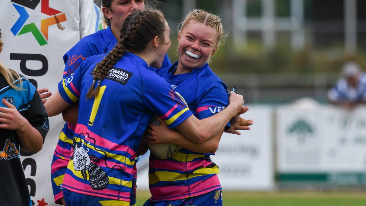 Xanthe Booth celebrates with Panorama Platypi teammates during Saturday's grand final victory. Picture by James Arrow