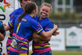 Xanthe Booth celebrates with Panorama Platypi teammates during Saturday's grand final victory. Picture by James Arrow