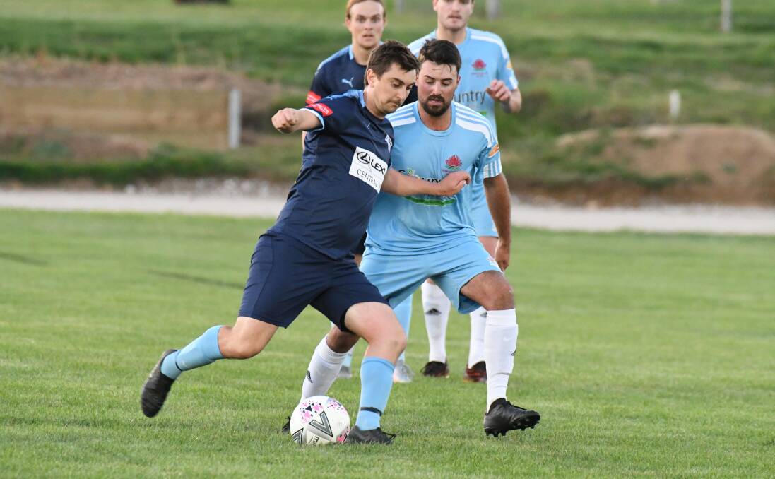 BOUNCE BACK: Glen Schein in action for Macquarie United during last weekend's disappointing loss. Photo: JUDE KEOGH