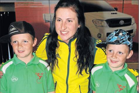NEXT GENERATION: Megan with Kurt (left) and Dylan Eather on her return to Dubbo in 2010. The Eather brothers are now two of the city's most exciting talents. Photo: FILE