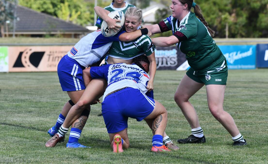 Dubbo star Alahna Ryan is met by the physical Bulldogs defence on Saturday. Picture by Jude Keogh