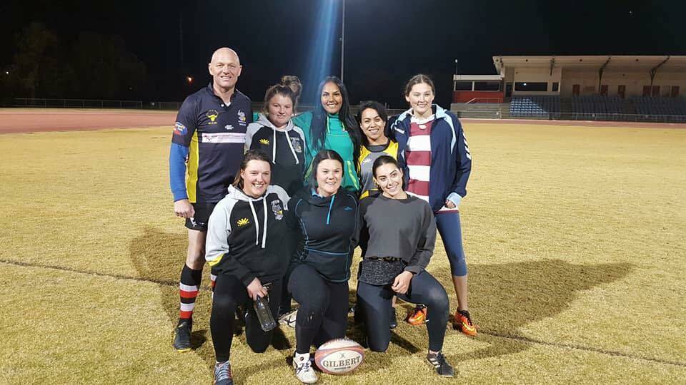 READY: Mahalia Murphy (centre, back) made an appearance at Rhinos training earlier this year and will be back at Dubbo on Saturday. Photo: CONTRIBUTED