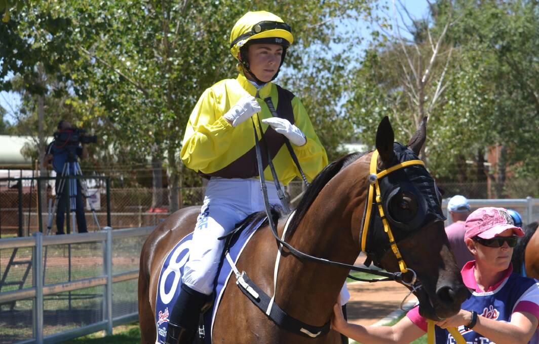 JOB TO DO: Mikayla Weir, pictured prior to a previous ride at Dubbo Turf Club, will ride in a heat of the Rising Star Series on Tuesday. Photo: NICK GUTHRIE