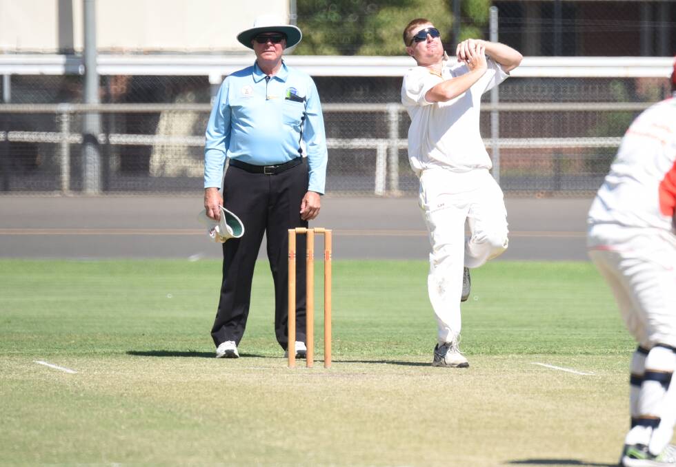 CHANGING: Umpire John DeLyall watches on as Mitch Bower bowls in last season's RSL-Whitney Cup grand final. Photo: BELINDA SOOLE