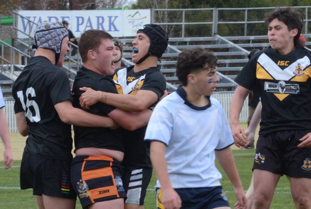 Orange High players celebrate during Friday's rugby league win over Bathurst. Picture: Riley Krause