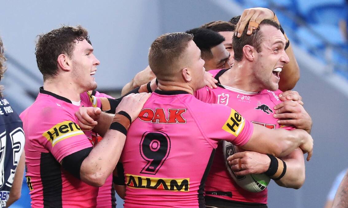 WESTERN CONNECTION: St John's junior Isaah Yeo (right) and his Penrith teammates will play Souths in Dubbo next season. Photo: PENRITH PANTHERS