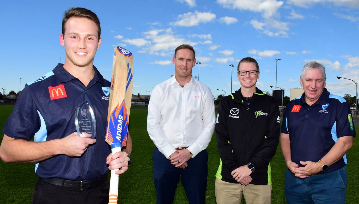 PRIZE: Ben Patterson with Dubbo cricket's Adam Wells, development officer Matt Ellis, and Cricket NSW's Bruce Whitehouse. Photo: BELINDA SOOLE