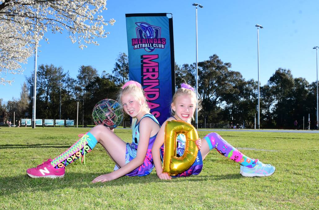 READY TO GO: Brydi K-Smith and Darcie K-Smith getting into the spirit of things ahead of Saturday's Crazy Sock Day at the netball courts. Photo: BELINDA SOOLE