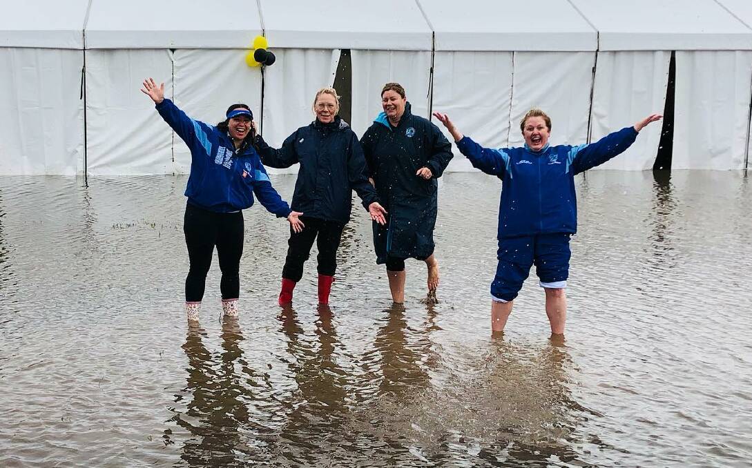 Dubbo Netball Association members tried to have some fun at a wet state titles carnival on the weekend. Picture: Dubbo Netball Association Facebook