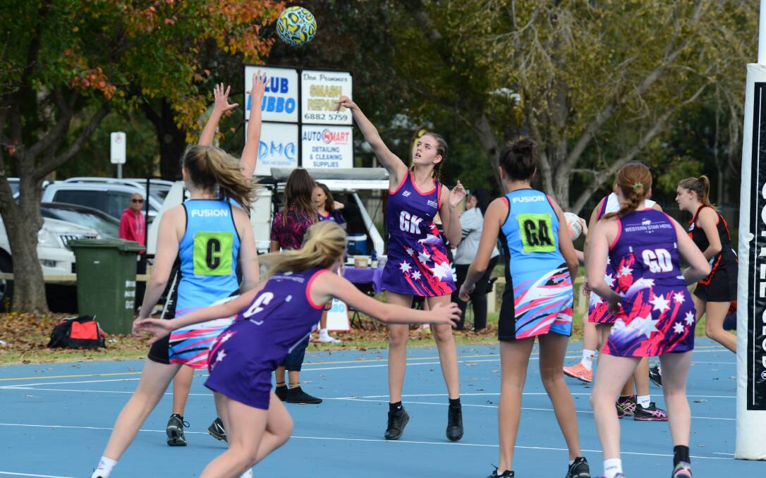 FIND A PASS: Isabelle McInnes launches the ball for the WMPD Sassy Sistas during Saturday's heavy loss to the in-form and dominant Fusions Magic. Photo: BELINDA SOOLE