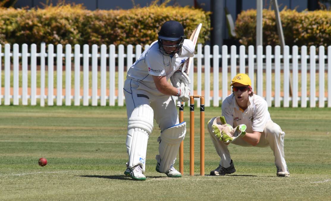 LEAD THE CHARGE: Ed Haylock was a satisfied man on Saturday as he made a century in Macquarie's massive day one total against Souths. Photo: BELINDA SOOLE