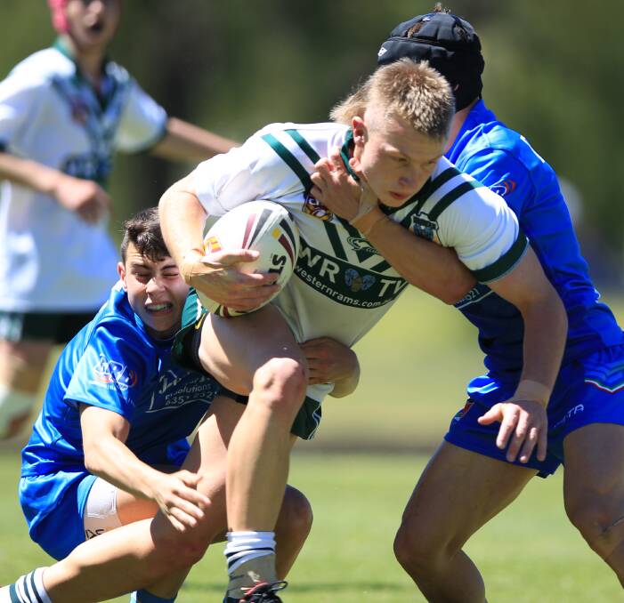 POWERHOUSE: Dubbo St John's forward Todd Deveigne charges through the FIRLA defence while playing for the Western Rams under-16s in Saturday's match at Bathurst. Photo: PHIL BLATCH