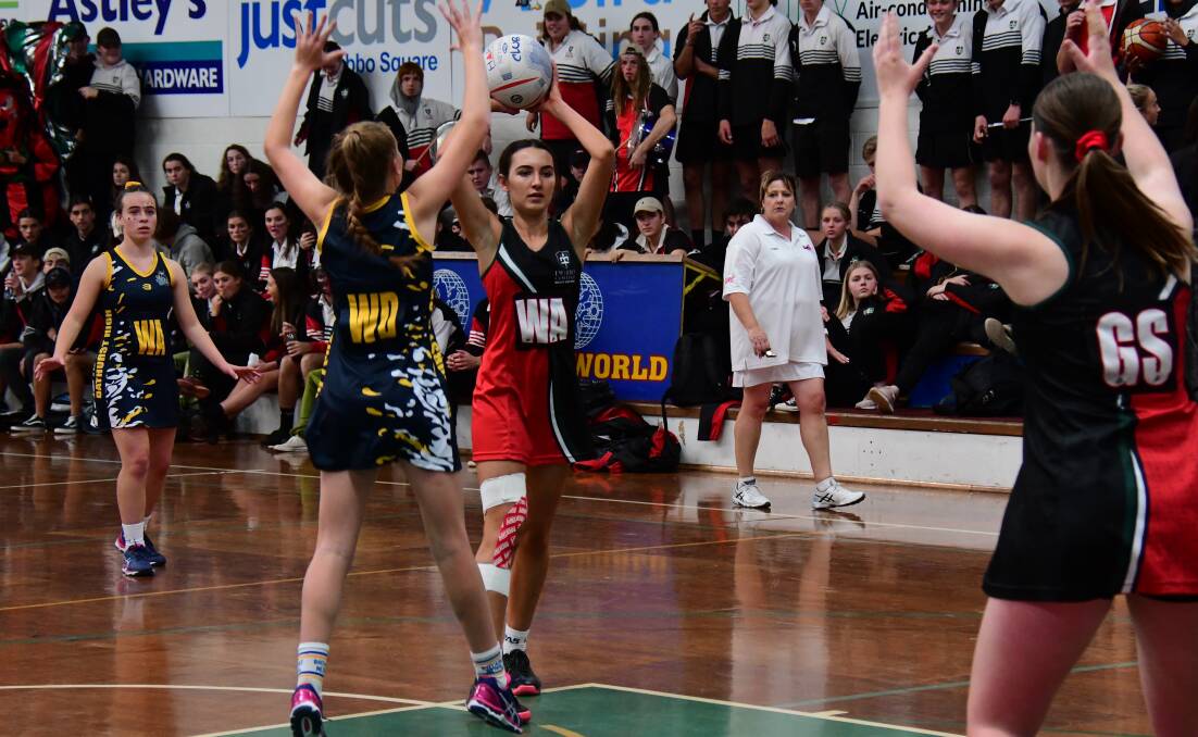 GO AGAIN: The kind of crowds on hand to watch Payton Reynolds and the Dubbo College netball side last year won't be allowed this year. Photo: BELINDA SOOLE