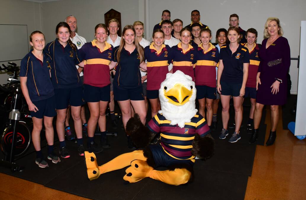 RECOGNITION: Students involved with the new program at St John's along with teachers Andy Haycock and Madie Easman, principal Kerry Morris, and new mascot Eddy the eagle. Photo: AMY McINTYRE
