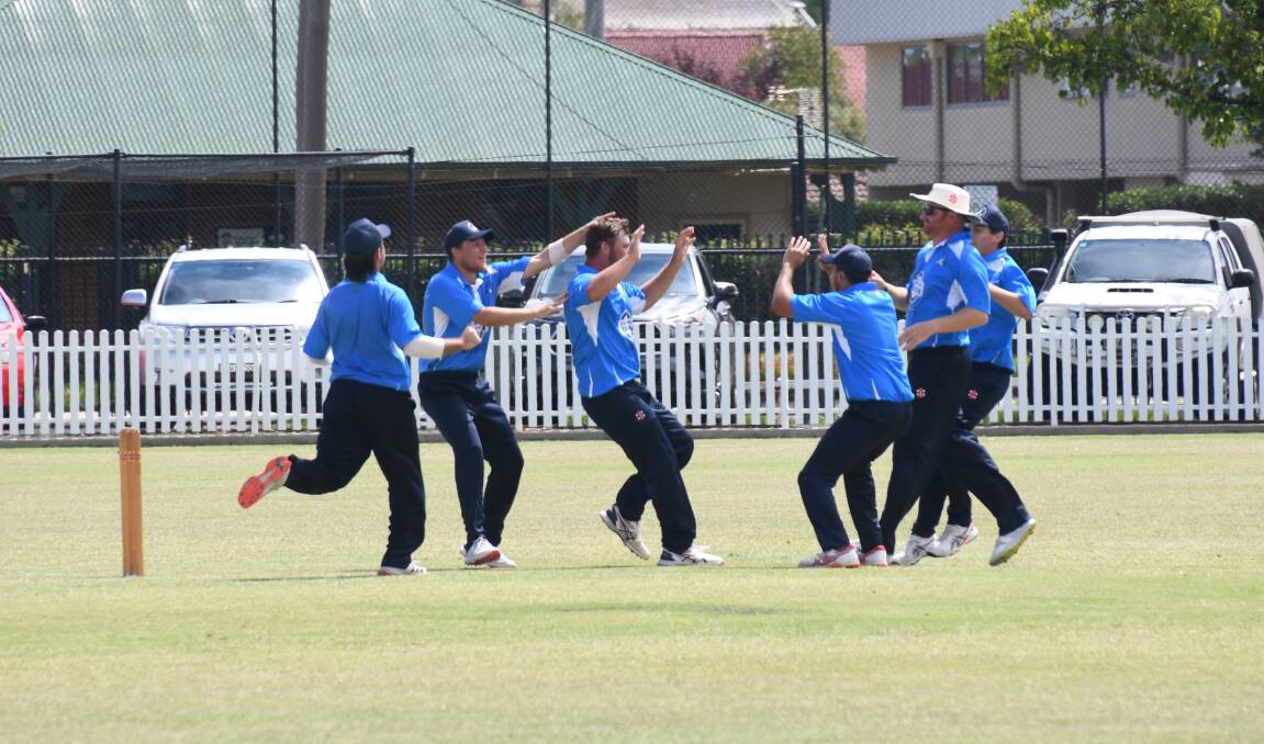 Dubbo players celebrate a wicket for Ben Knaggs in last season's Western Zone Premier League decider. Picture by Amy McIntyre
