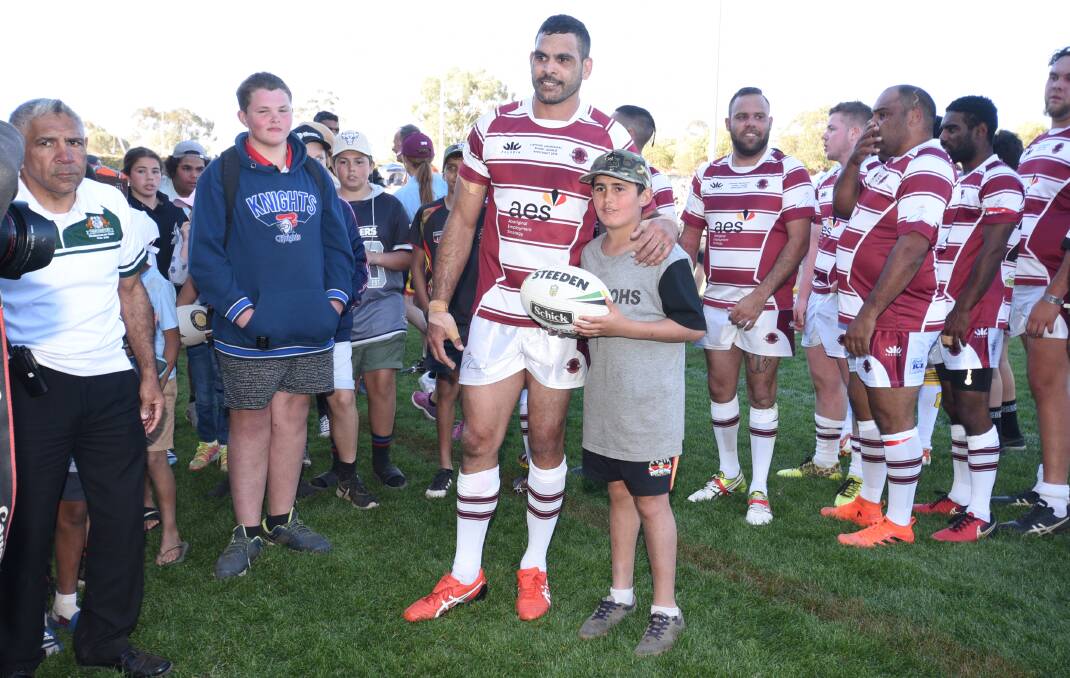 SPECIAL: Rugby league great Greg Inglis spent time with a huge amount of young fans while at Dubbo for the Koori Knockout. Photo: AMY McINTYRE