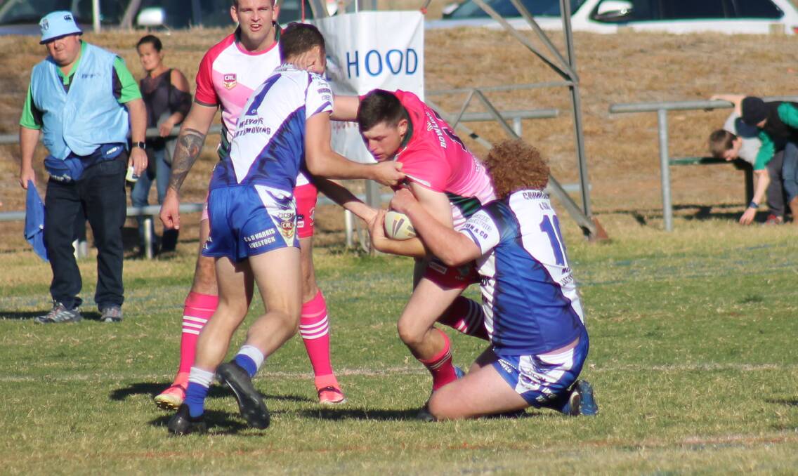 GETTING IT DONE: Back-rower Sam Christensen scored a double for Dunedoo on Saturday, helping the Swans score a narrow win.