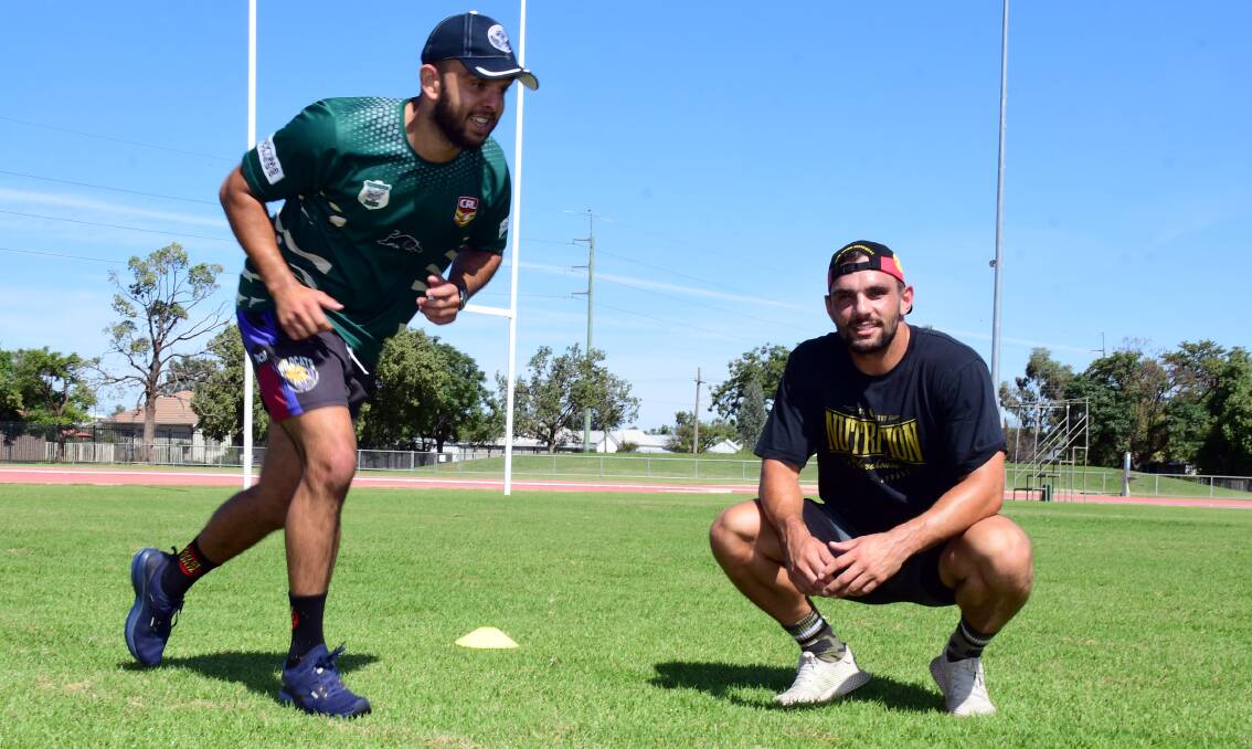 LOOKING UP: Alex Ronayne (left) and Josh Toole, pictured prior to the lockdown, will be back with the Raiders this weekend. Photo: BELINDA SOOLE