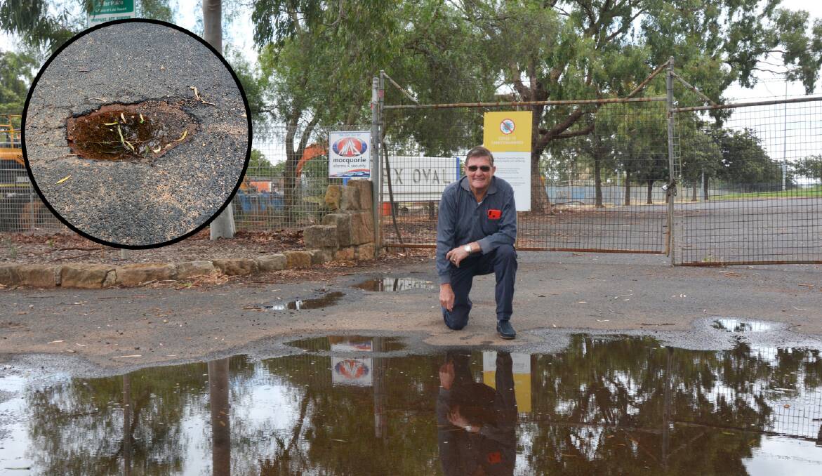 DISAPPOINTED: Todd O'Dea at what he labels a "terrible" entry to Apex Oval and (inset) one of the potholes along the road into the ground. Photo: NICK GUTHRIE