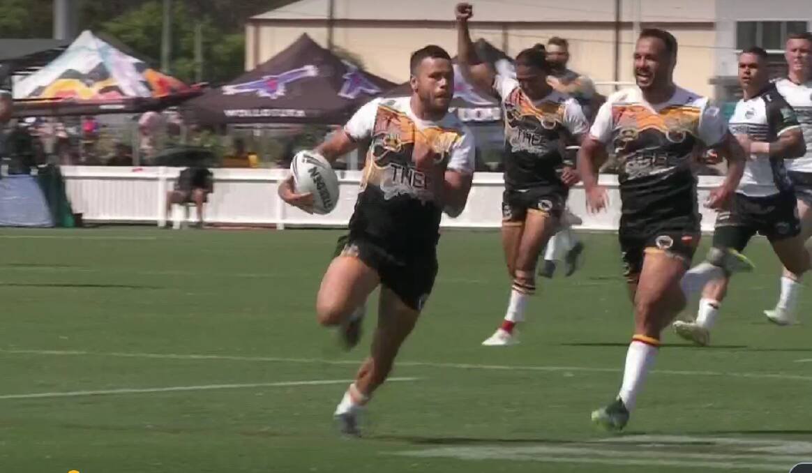 Matt Milsom races away for his third try for WAR in Monday's semi-final win. Picture via SBS coverage