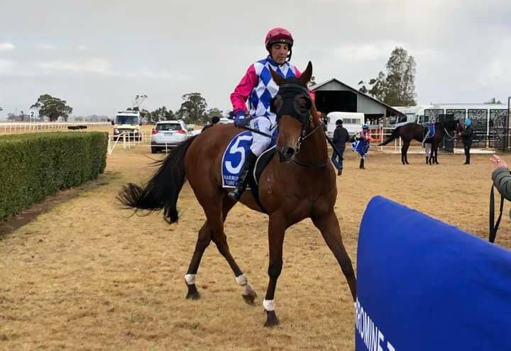 GOT IT: Anthony Cavallo and Mr Dumont return to the yard after taking out Sunday's feature. Photo: NARROMINE RACES FACEBOOK PAGE