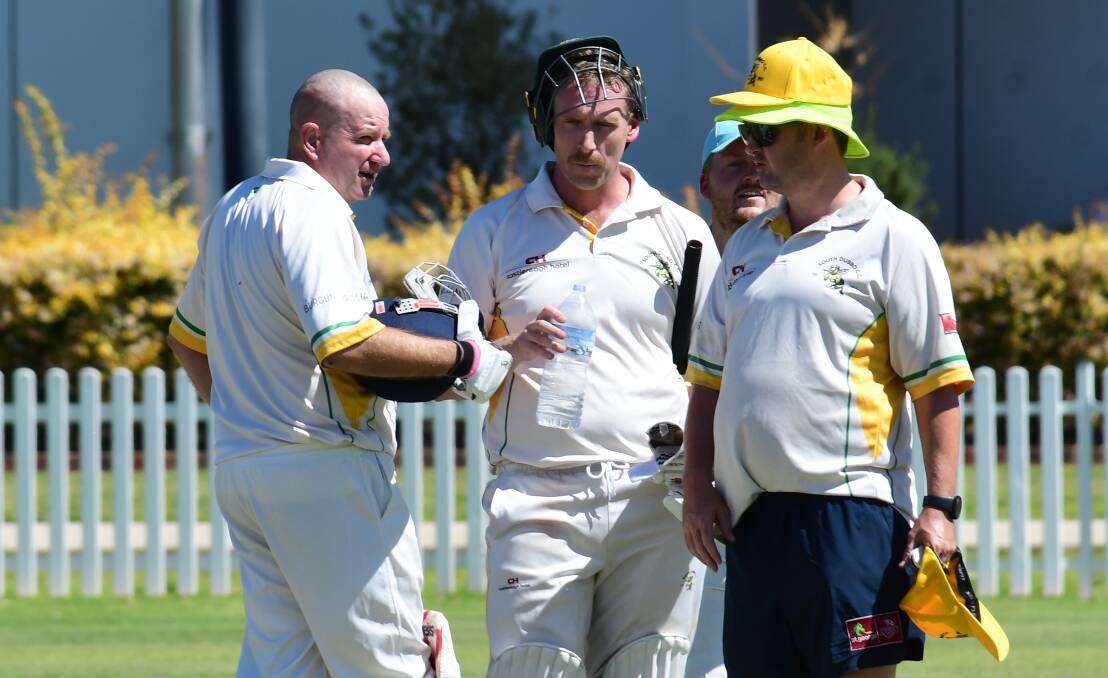 SWEAT IT OUT: Adam Wells (centre) and Dubbo cricketers could be in for another hot weekend of action. Photo: AMY McINTYRE
