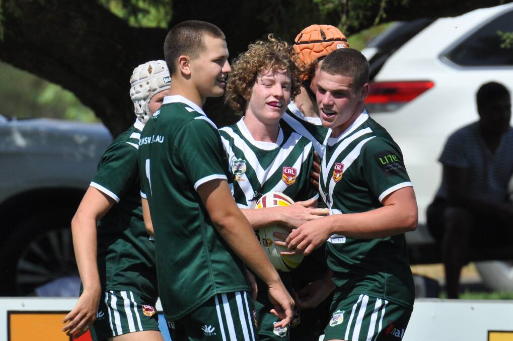 THAT TIME AGAIN: Western Rams under 16s players celebrate a Johns Cup try last season. Photo: NICK McGRATH