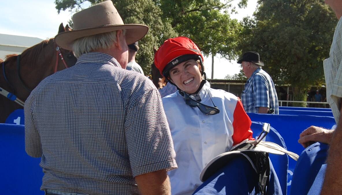 ALL SMILES: A delighted Grace Willoughby chats with trainer Rodney Robb after Monday's win. Photo: ZAARKACHA MARLAN