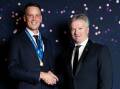 REWARD: Chris Tremain (left) with Steve Waugh after collecting the top prize at Thursday's Cricket NSW awards night. Picture: Cricket NSW