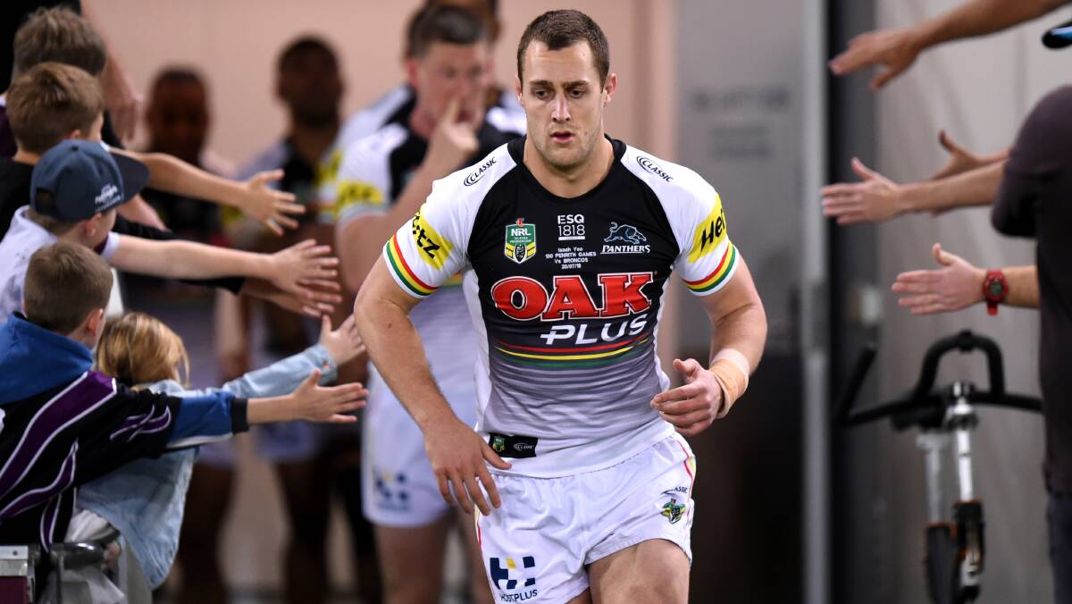 EFFORT: Isaah Yeo runs out at Suncorp on Friday night in his 100th NRL game. Photo: NRL PHOTOS