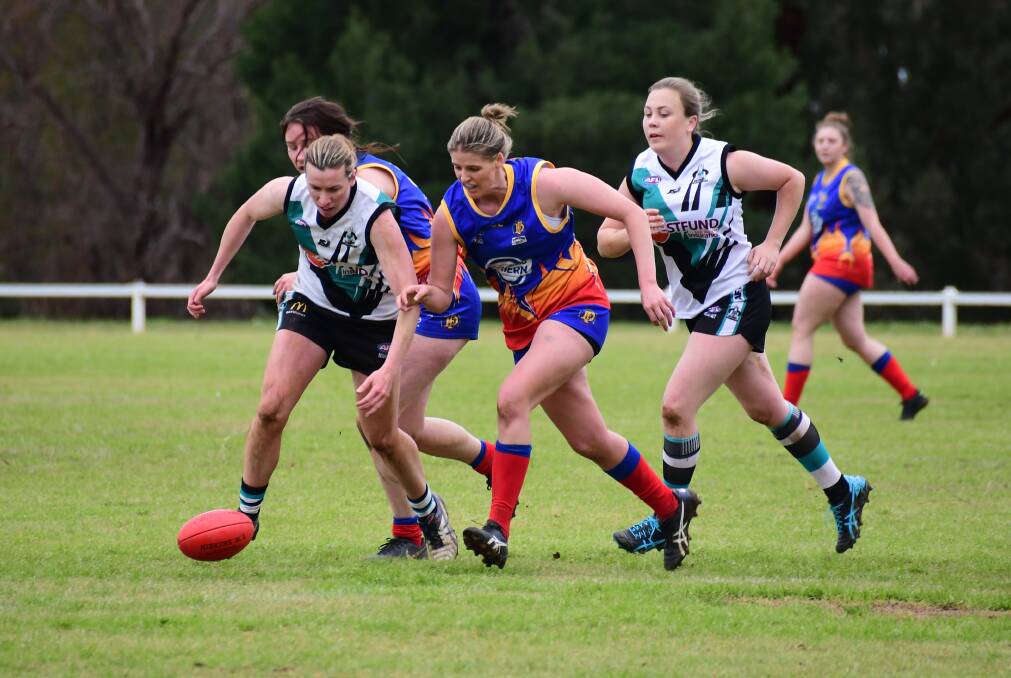 EDGED OUT: The Demons women were beaten on Saturday. Photos: AMY McINTYRE