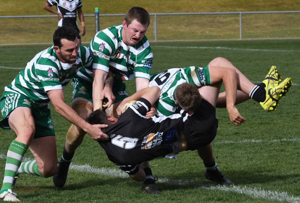 HE'S BACK: Ben Marlin (centre) made his long-awaited return for CYMS last weekend. Photo: AMY McINTYRE